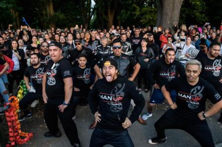 Members of different biker gangs perform the haka as a tribute to victims in Christchurch, New Zealand, on March 20, five days after the twin mosque shootings. The Mongrel Mob gang said it would not give up its weapons set to be banned in the wake of the attack. ANTHONY WALLACE/AFP/GETTY IMAGES